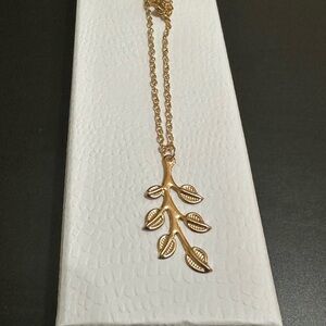 Gold tone leaf necklace. Bohemian. Brand new